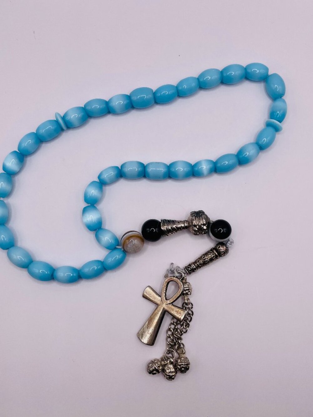 Egyptian-inspired prayer beads featuring sky blue gemstones and Ankh 15"